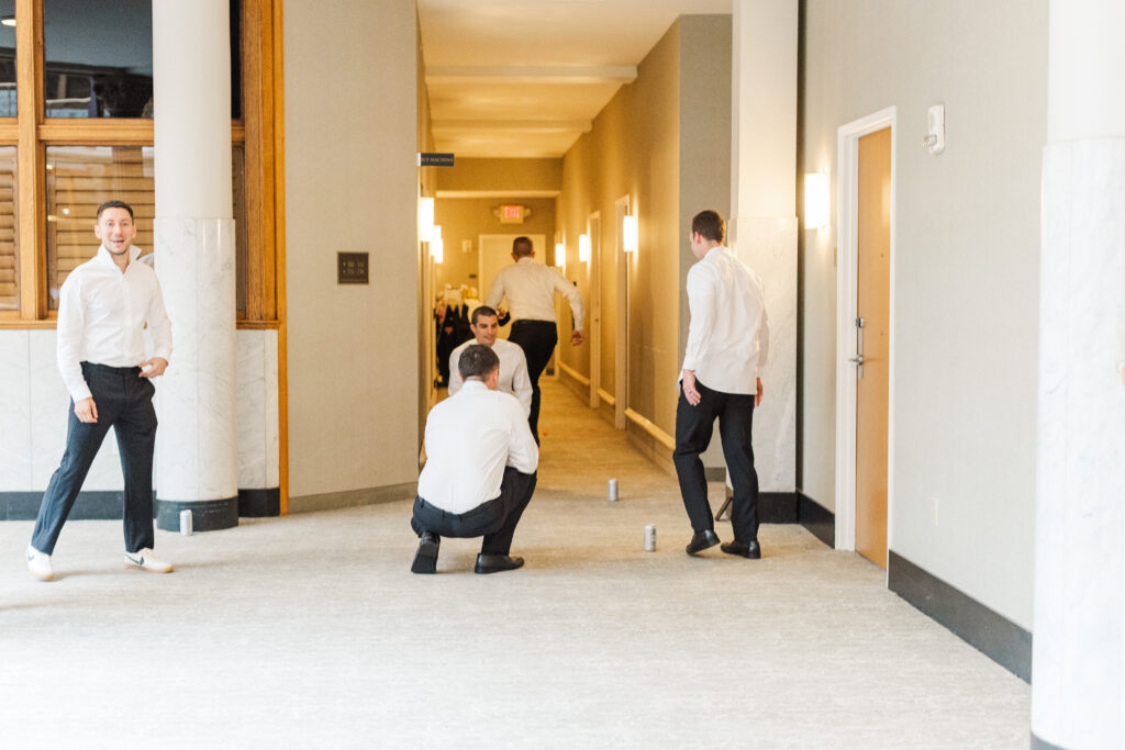 Groom and groomsmen getting ready at the Hyatt at the Arcade before a Cleveland wedding