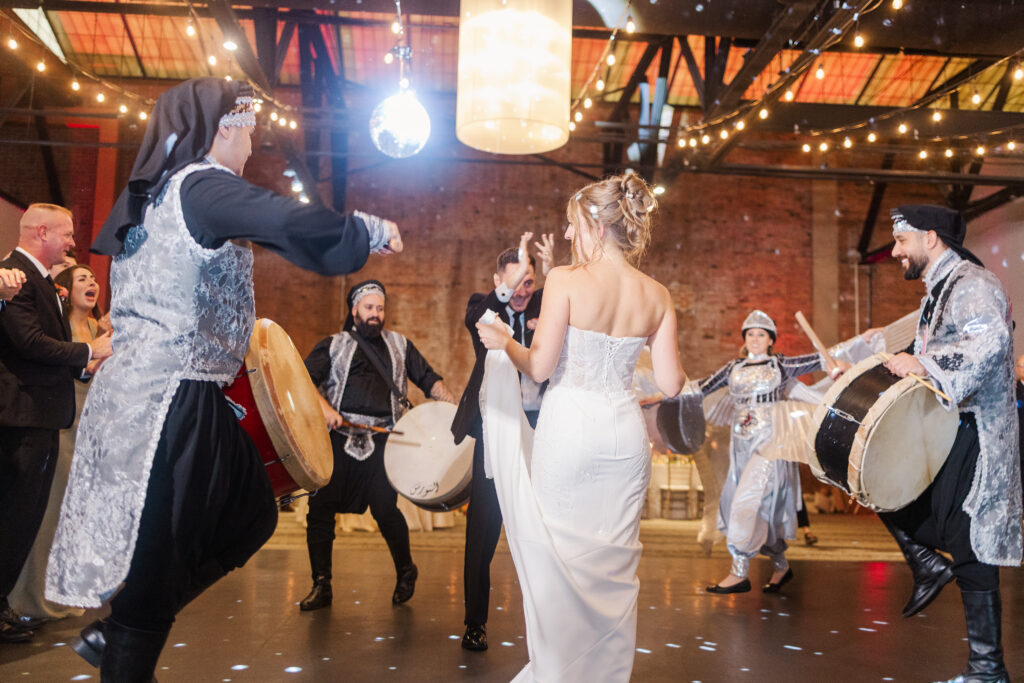 Bride and groom dancing during their Windows on the River reception