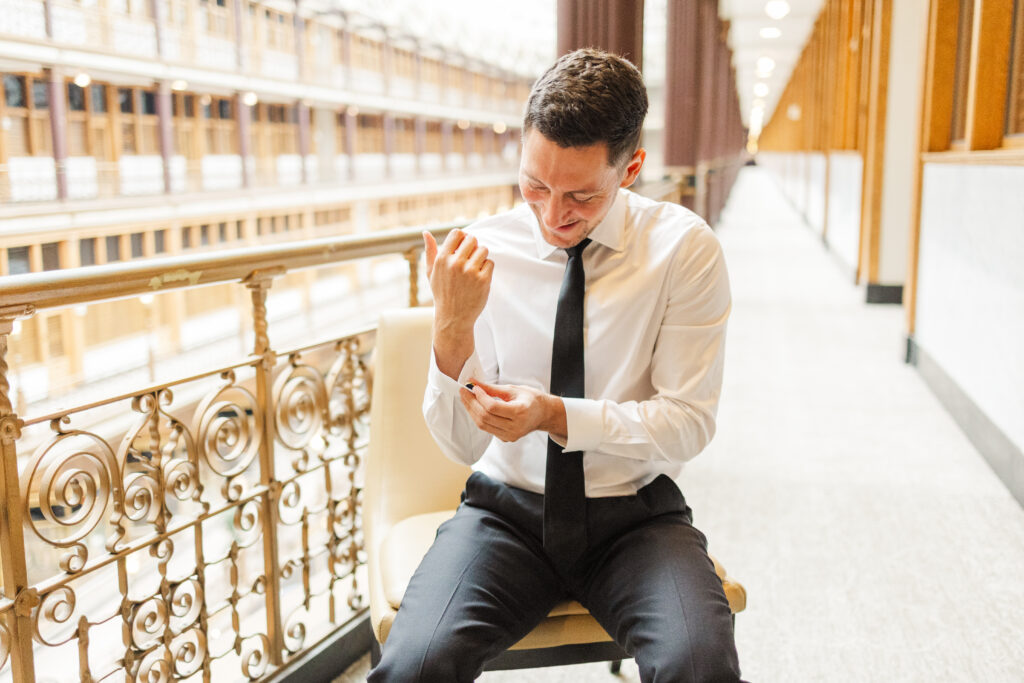 Groom and groomsmen getting ready at the Hyatt at the Arcade before a Cleveland wedding